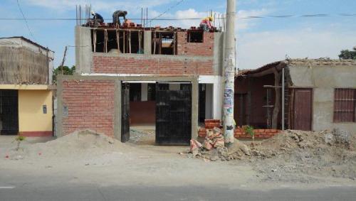 Courtyard wall replaces old adobe structure